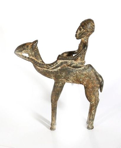 Jumper

Dogon, Mali 

Rider wearing a cap...