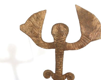 Monnaie

Idoma, Nigéria 

Monnaie formant...