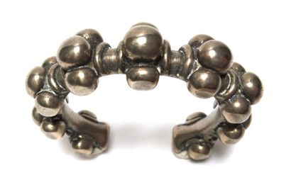 Bracelet decorated with pearls. Silver plated...