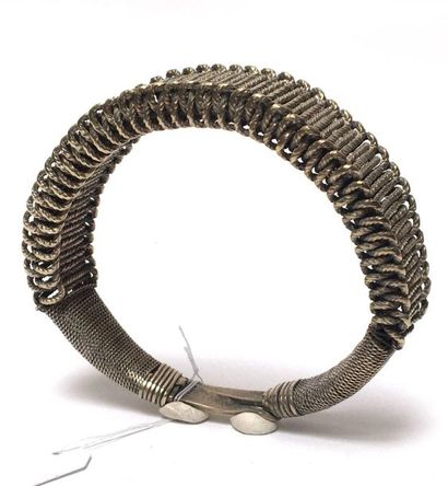 Pair of braided metal bracelets. Silver plated...