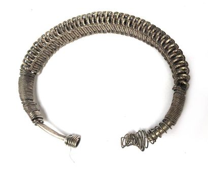 Pair of braided metal bracelets. Silver plated...