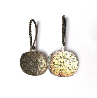 Pair of earrings. Silver plated metal. Indonesia,...