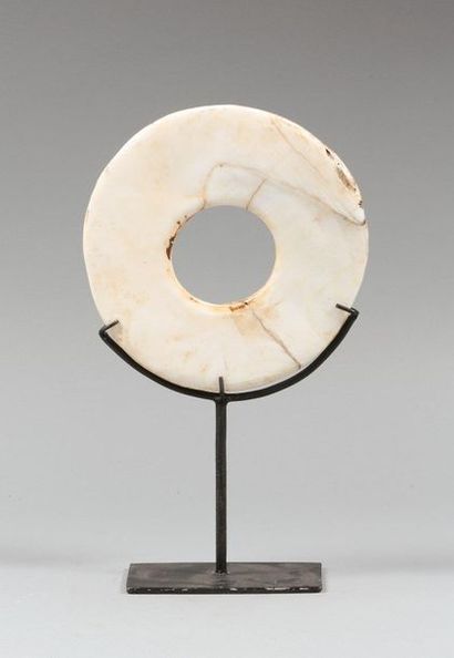 Round mint made of shells. Indonesia, 20th...