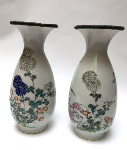 Pair of piriform porcelain vases decorated...
