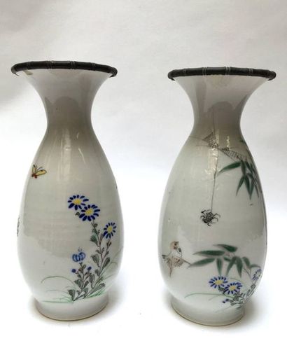 Pair of piriform porcelain vases decorated...