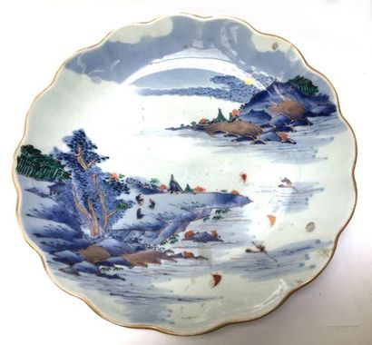 Imari porcelain dish with landscape decoration....