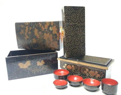 Two boxes with red and gold lacquered decoration...