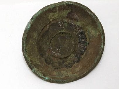 Round bronze fibula. China, Han, 206 B.C....