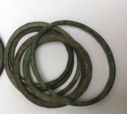 Eight bronze bracelets. China, Han, 206 B.C....