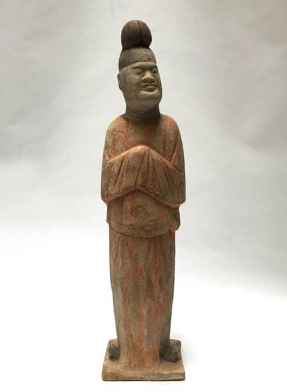 Eunuch standing on a base with his hands...