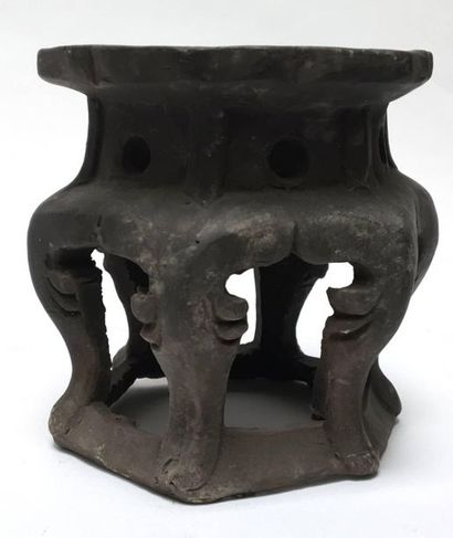 Six-legged table in black terracotta. China,...