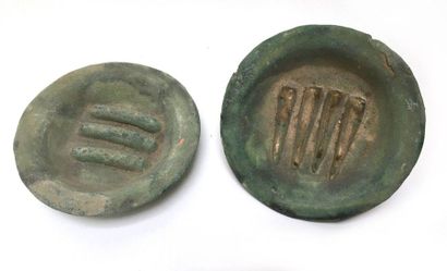 Two plates with glazed terracotta offerings....
