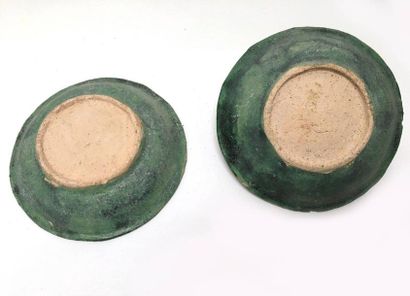 Two plates with glazed terracotta offerings....