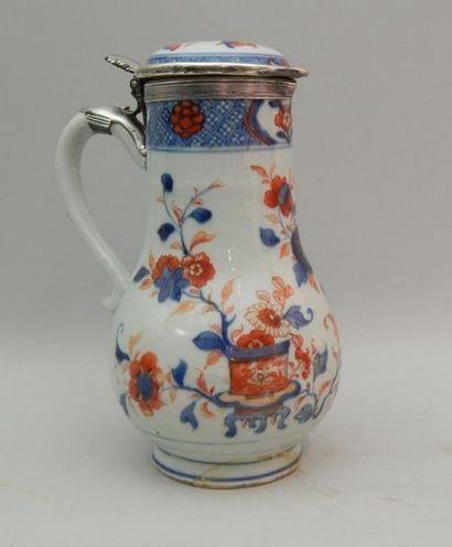 Porcelain covered jug decorated with two...