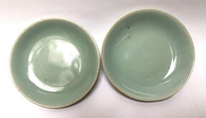 Two green celadon porcelain bowls. China,...