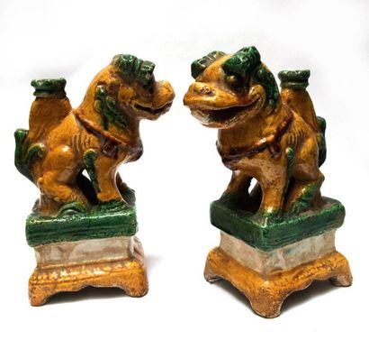 Two incense sticks holders in the shape of...