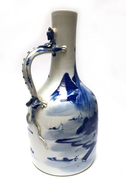 Porcelain pitcher, blue, white, the handle...