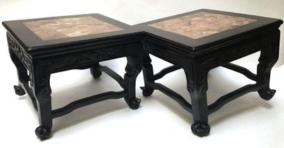 Two wooden and marble saddles. China, early...