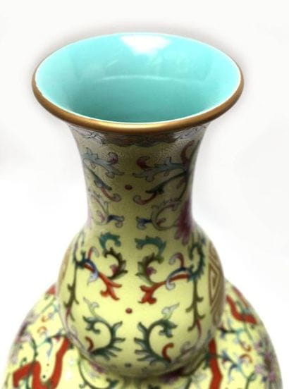 Double vase with yellow porcelain bottom....