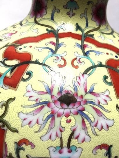 Double vase with yellow porcelain bottom....