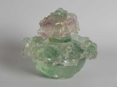 Fluorite bottle with floral decoration. China,...