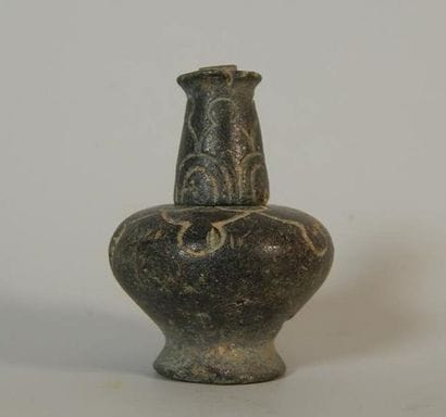 Cosmetic bottle with removable neck and incised...