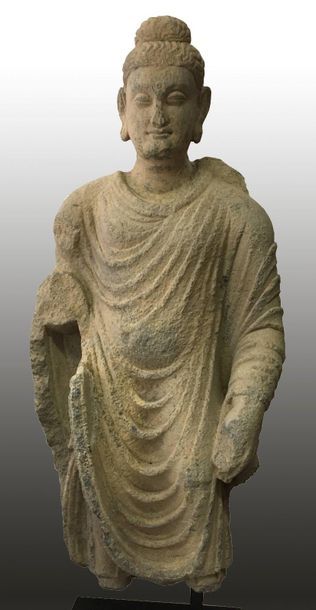 Large body of standing Buddha, with his hair...