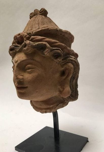 Terracotta woman's head. 
 
Greco-Buddhist...