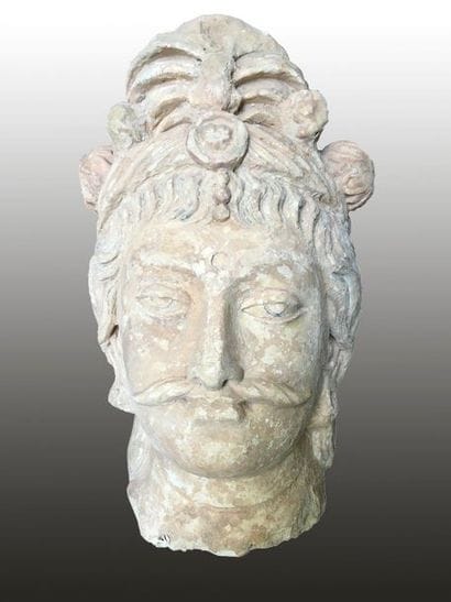 Boddhisattva head with turban decorated with...