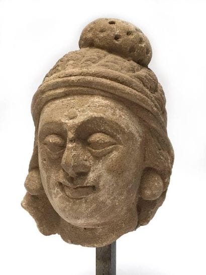Stucco maid's head. 
 
Greco-Buddhist Art...