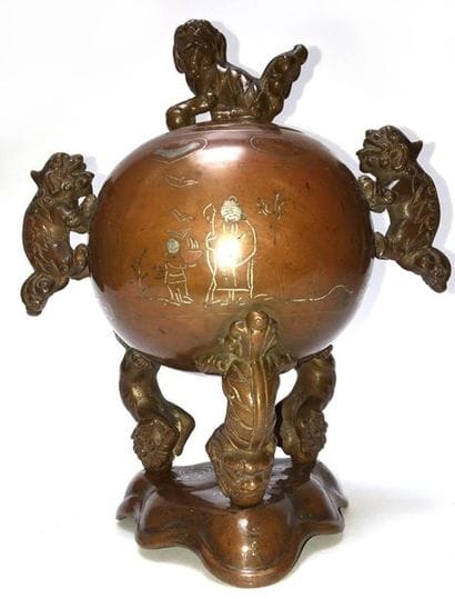 Tripod perfume burner decorated with lions...
