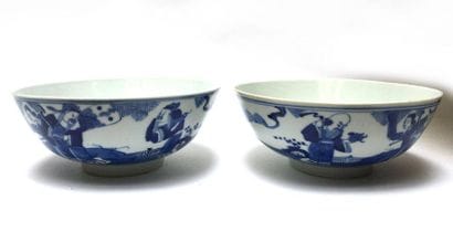 Two blue, white porcelain bowls with characters...