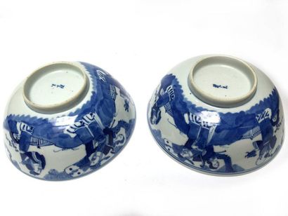 Two blue, white porcelain bowls with characters...