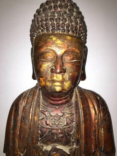 Buddha sitting in the position of 