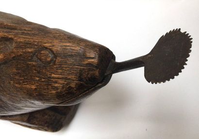 Wooden rabbit-shaped coconut breaker or grater....