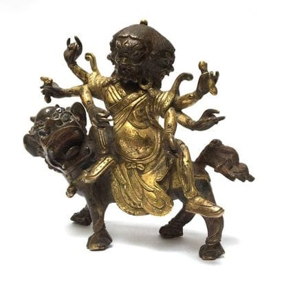 Guardian God with three heads and six arms,...