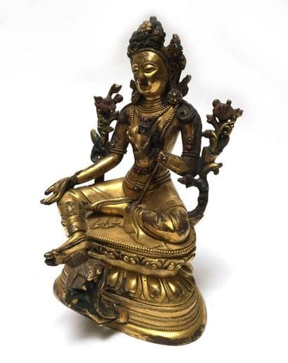 Green bronze Tara. Tibet-Nepal, 19th century....
