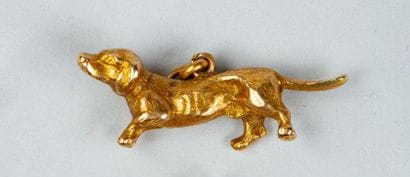 BRELOQUE ancienne en or jaune 18k (750/°°)...