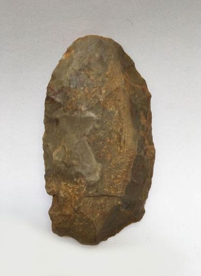 Flint axe carved in the Upper Paleolithic...