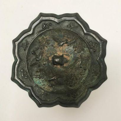 Pair of bronze mirrors with green patina...