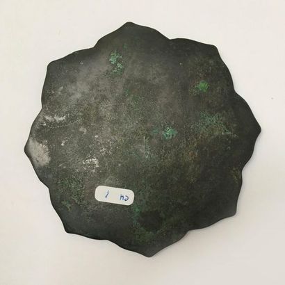Pair of bronze mirrors with green patina...