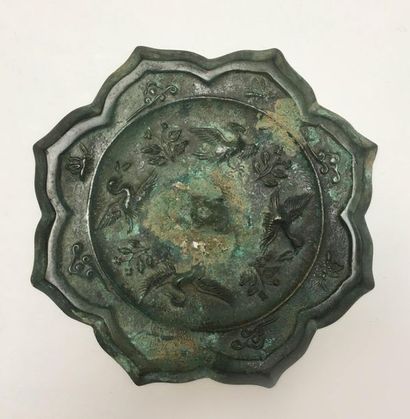 Pair of bronze mirrors with green patina...