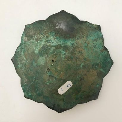 Pair of bronze mirrors with green patina...