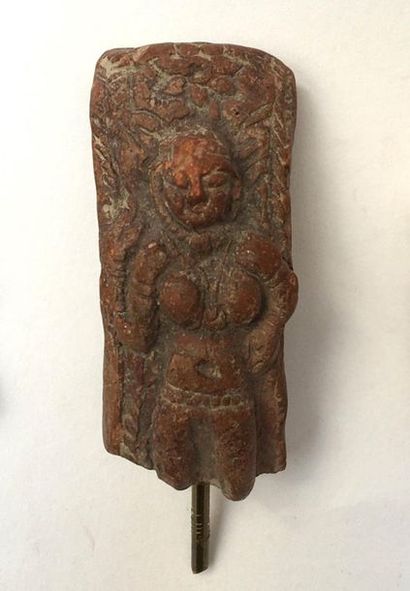 Red terracotta plaque representing dancing...