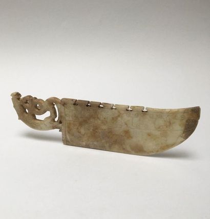 Pale yellow jade ritual knife with curved...