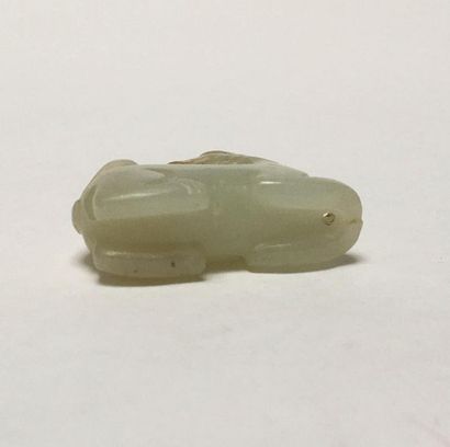 Sharpeï in veined light green jade. The dog...