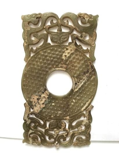 BI disk with four dragons facing each other,...