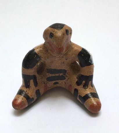 Painted terracotta figurine representing...