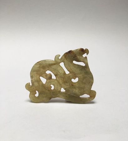 Winding amber jade dragon biting its tail....