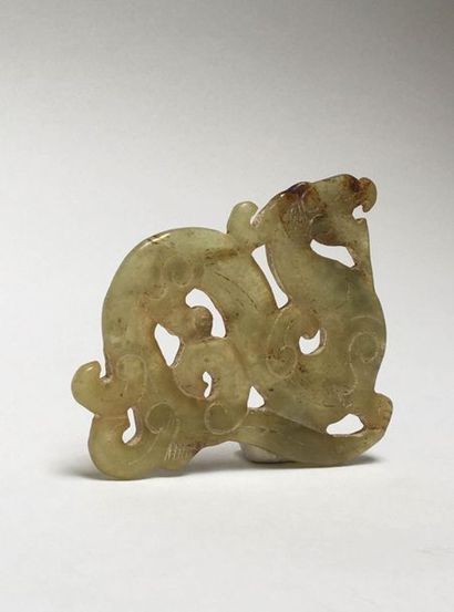 Winding amber jade dragon biting its tail....